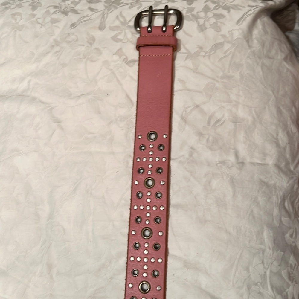 Large, genuine, leather pink belt
